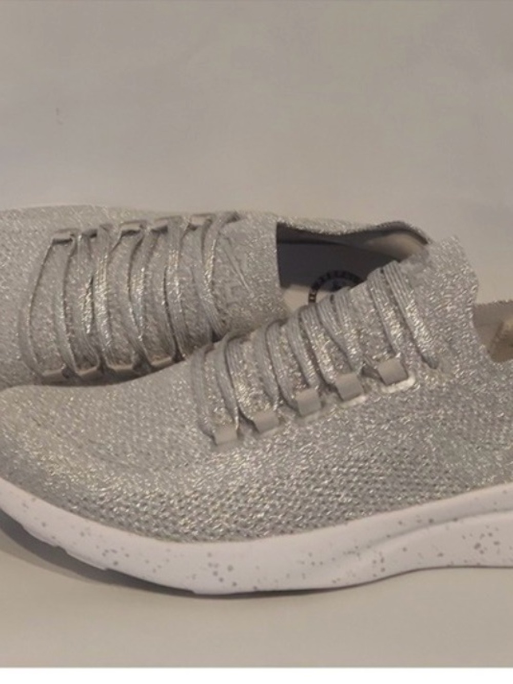NWOT! Designer Women's APL Tech Loom Breeze Knit Slip-On Silver Sneakers Size 10